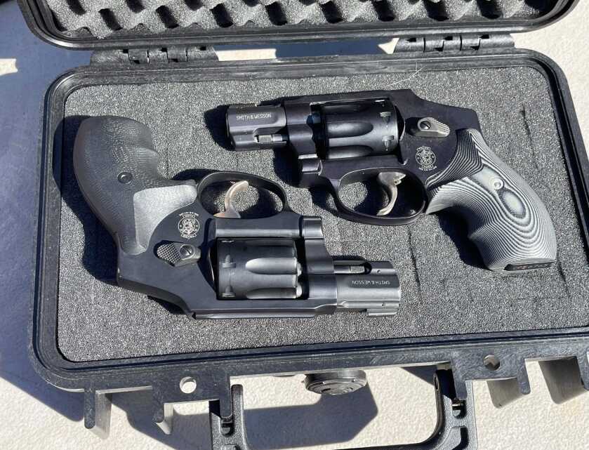 Smith & Wesson 43C and 351C J-frame rimfire revolvers in a case