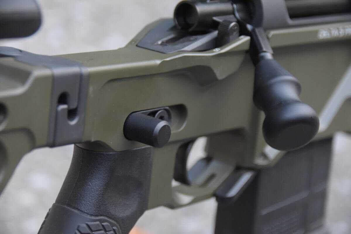 The thumb stop on this rifle is located on the right side, but is swappable to the left side.