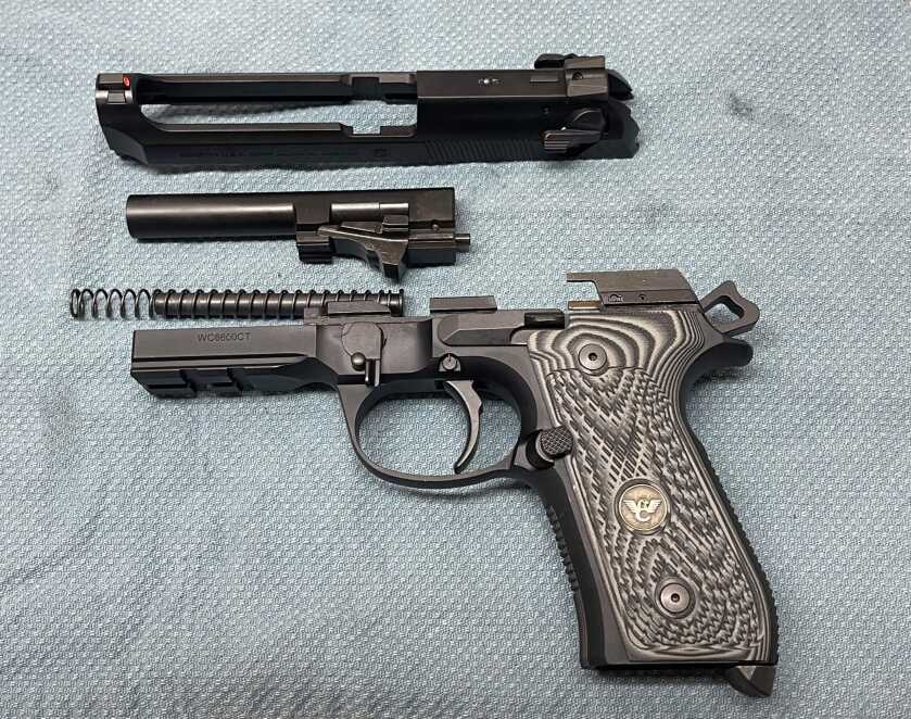 Wilson Combat Beretta 92G Centurion 9mm pistol field stripped with VZ grips