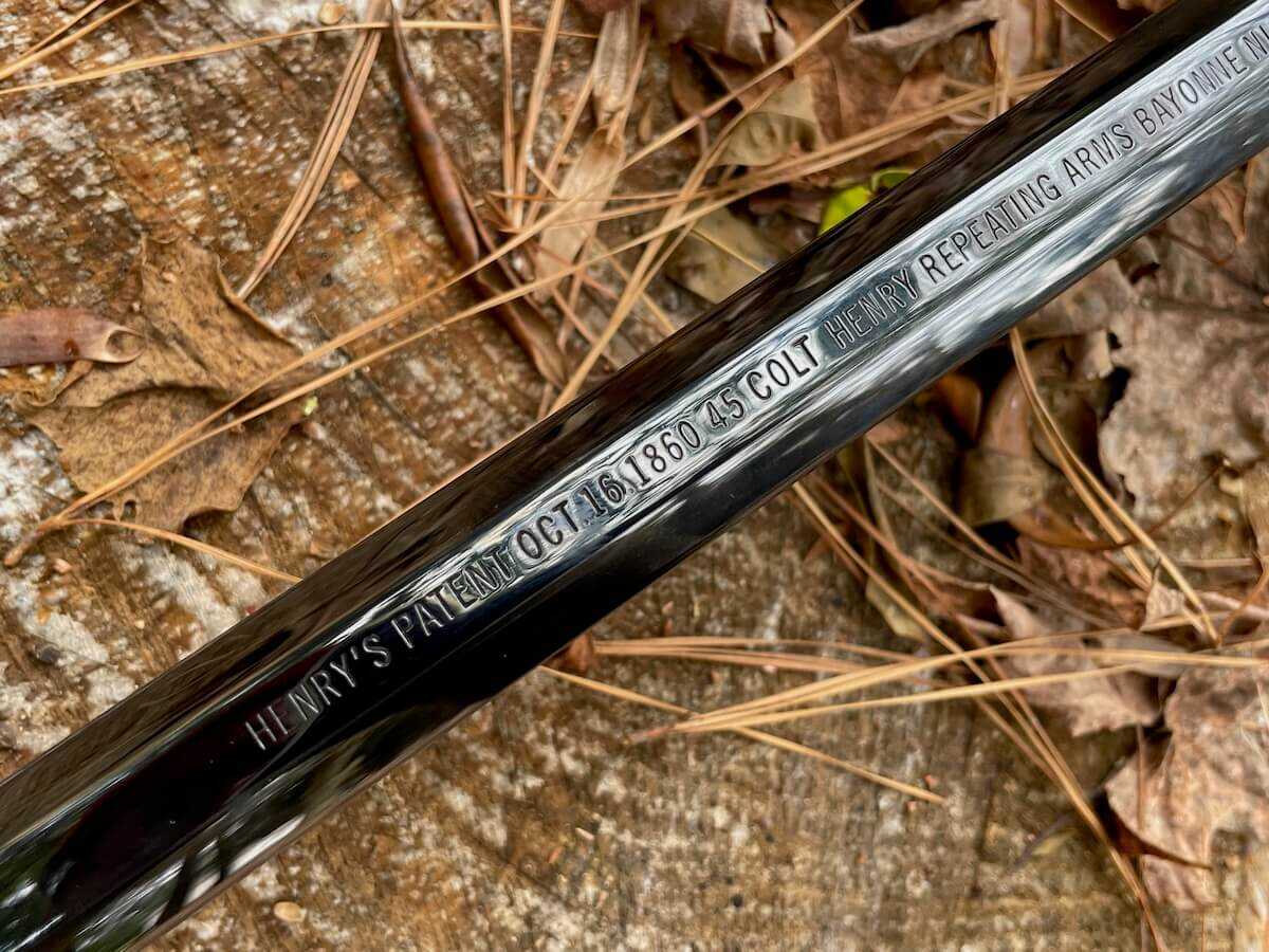 New Original Henry brass frame lever action rifle in hunt camp