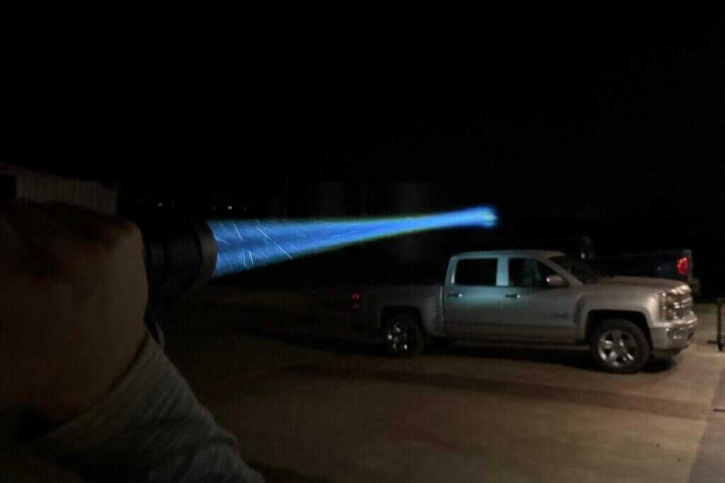 Photo of the light shining at a cow nearly 900 yards away