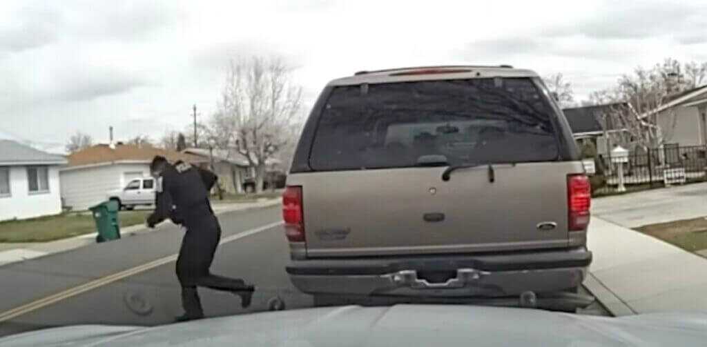 Officer runs after suspects opens fire.