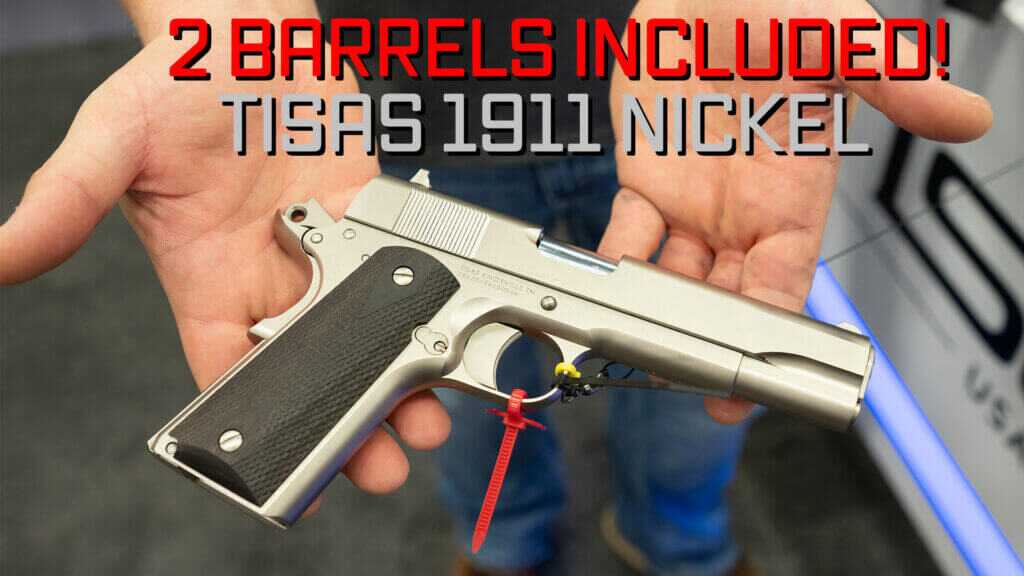 True holding out a nickel-plated Tisas stakeout pistol.