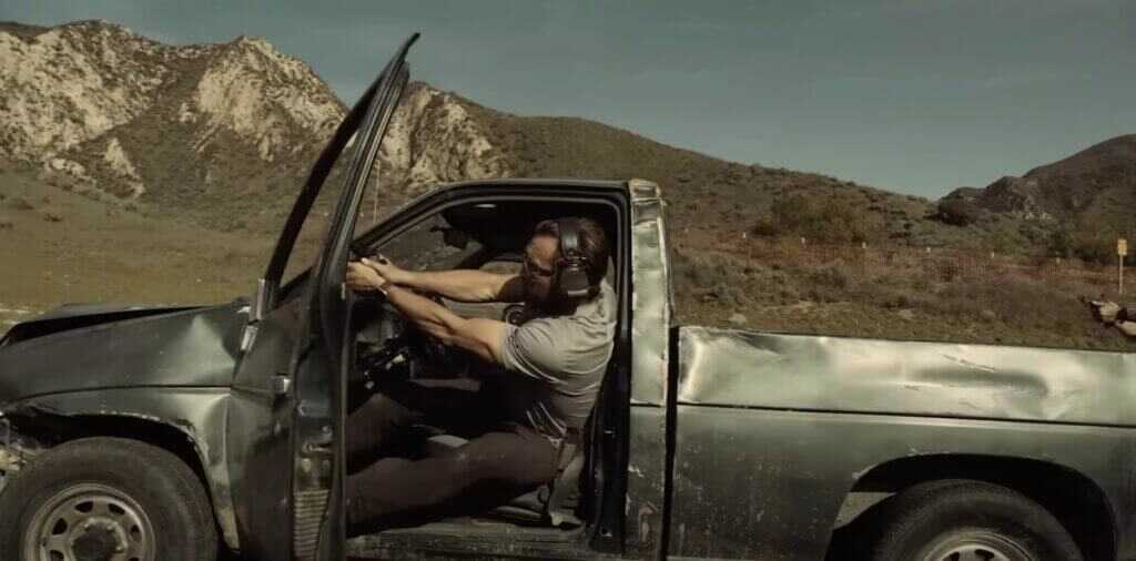 Navy SEAL shooting out a truck.