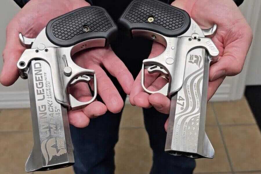 The satin DT47 pistol from Bond Arms being held in the hand.