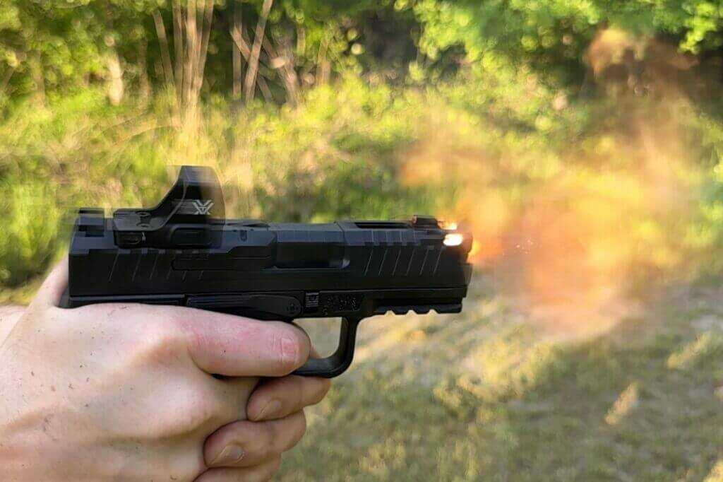 Pistol firing.