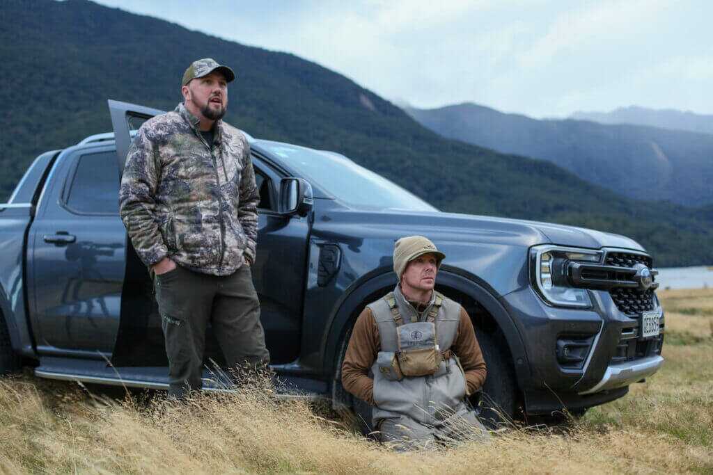 Two guys in front of truck  Bowhunting Tahr