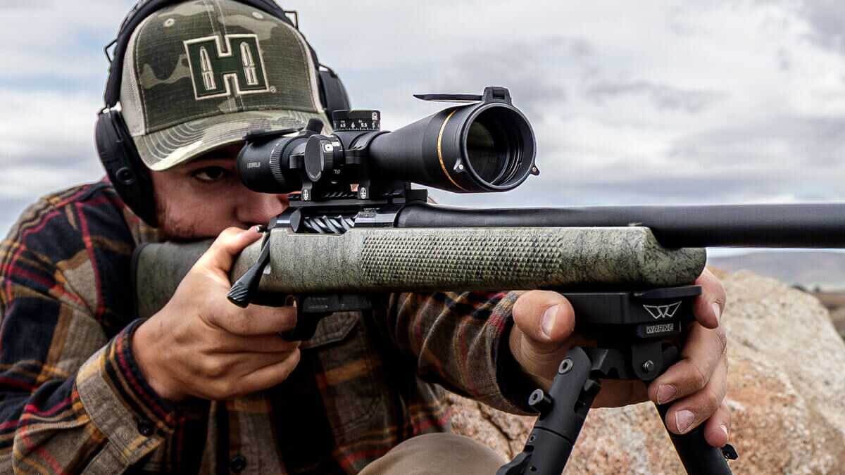 Shooter behind a Leupold VX-6HD Gen 2 riflescope, best premium hunting scope 2026