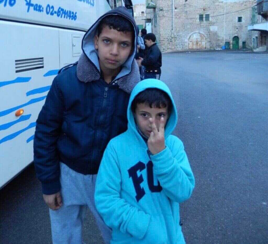 Palestinian boys in a street scene during tense times