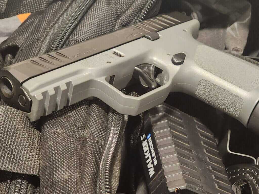 gray handgun on range bag CA-compliant