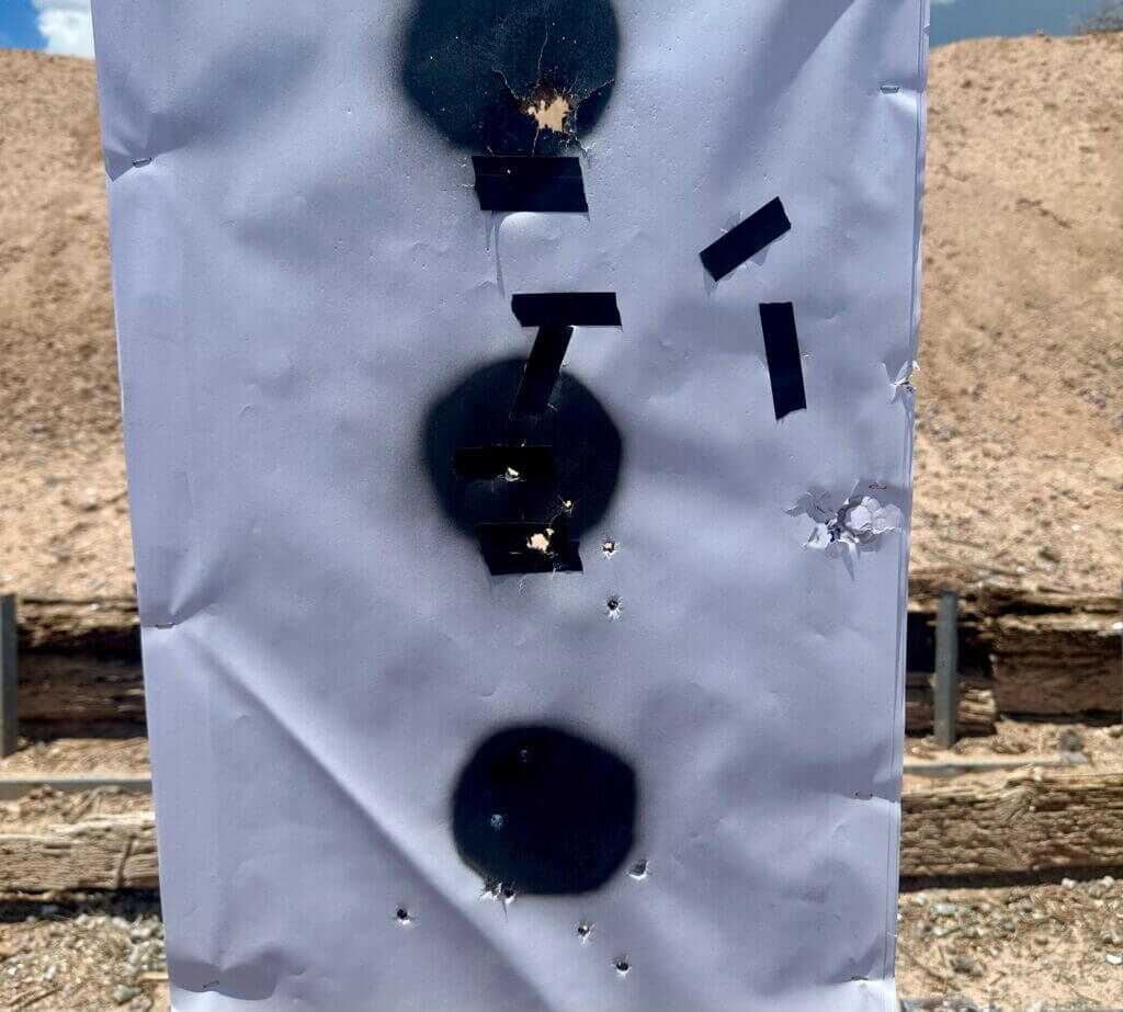 Closeup of a target that has been shot by the 940 Pro Tactical SPX at various distances.