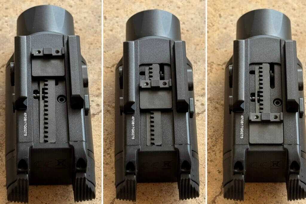 Close-up of the Nitecore NPL35 sliding rail stopper mounting system on a pistol light
