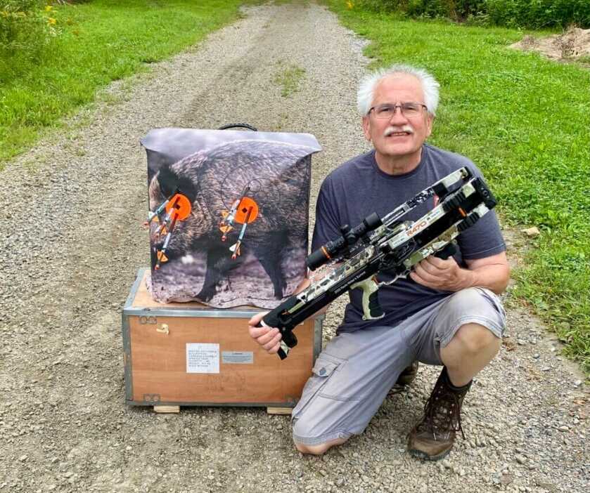 Targets showing 50 yard rested group and 30 yard offhand group with Ravin R470