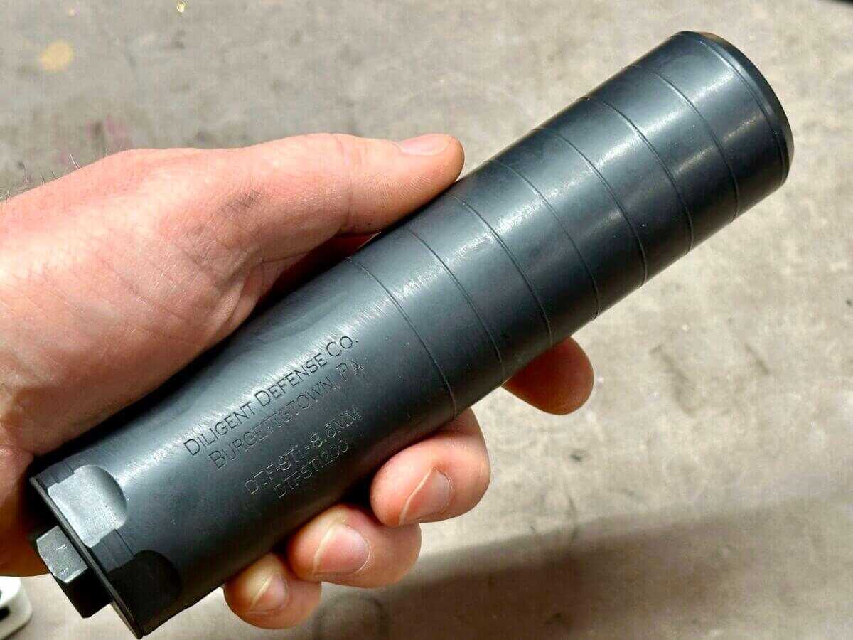 Diligent Defense DTF STI suppressor in hand, best hunting suppressor for .338 and big game 2026