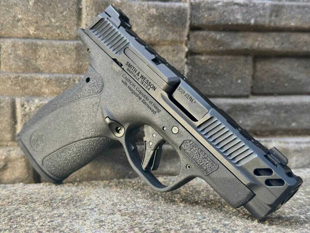 Close view of S&W Performance Center Bodyguard 2.0 Carry Comp .380 on stone background