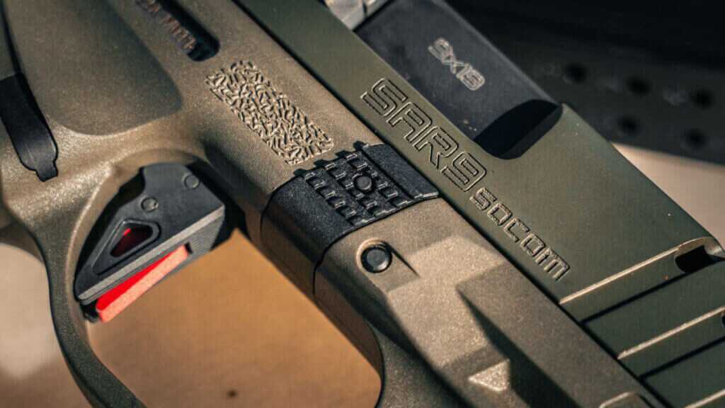 Flat faced aluminum trigger on the SAR9 SOCOM