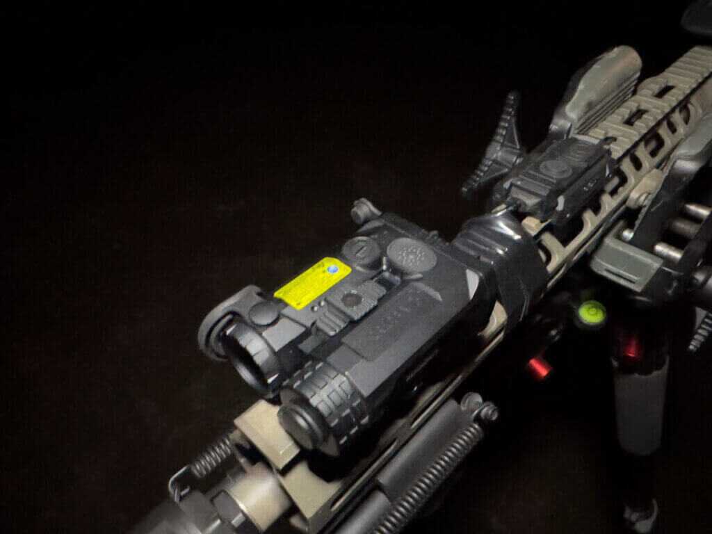 Holosun IRIS-GR3 center fire button and included remote on rifle rail