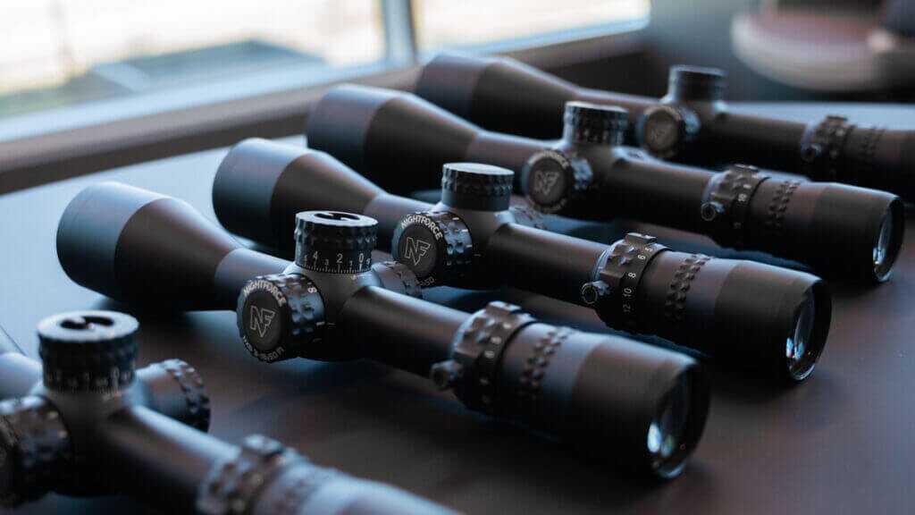 Nightforce NX6 riflescope family on display with turrets and magnification rings visible