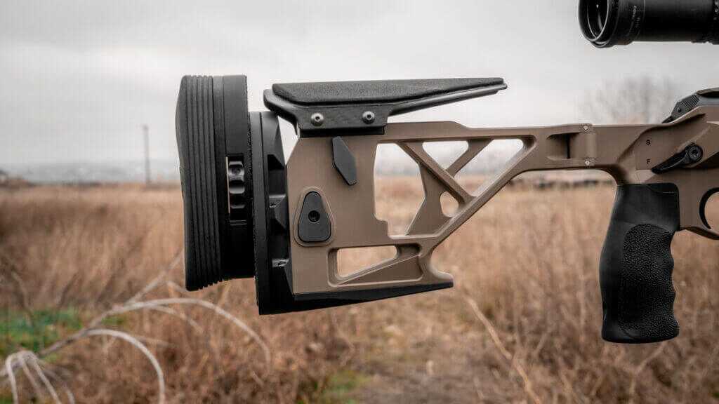 Seekins SIC folding stock locked open, carbon cheekpiece and bag rider visible