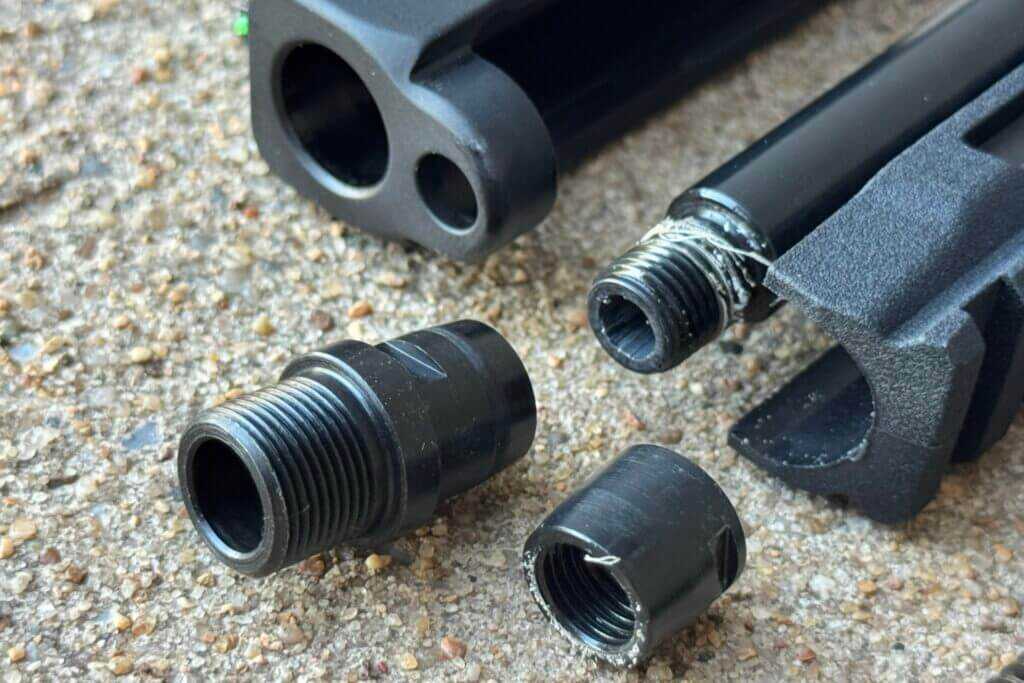 M&P22X threaded barrel hidden under flush bushing with included extended threaded adapter for suppressor use