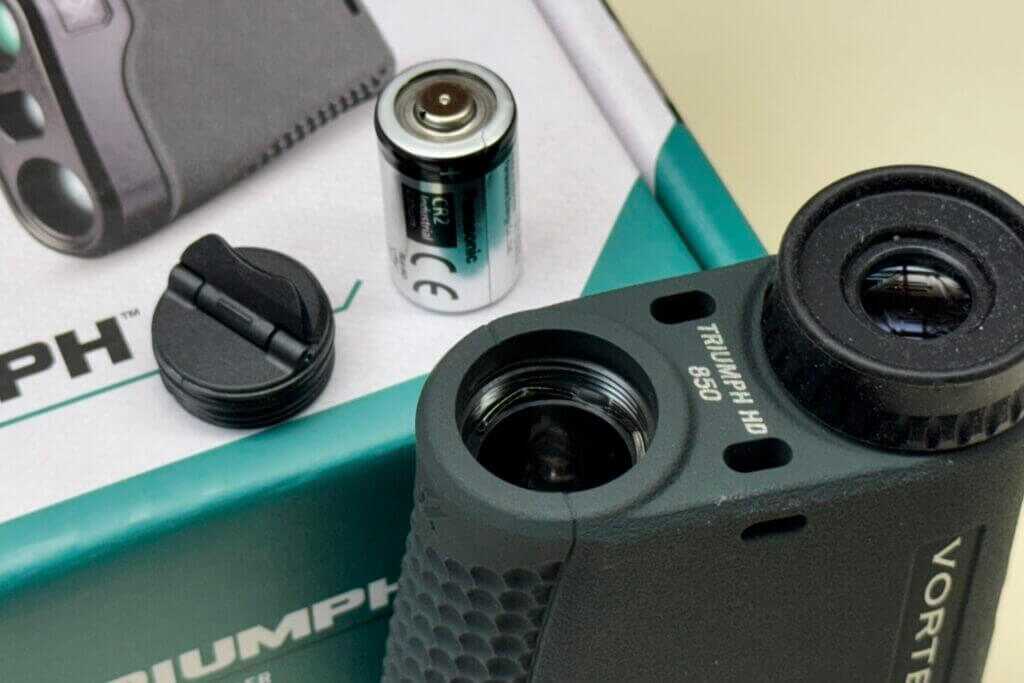 Battery compartment of the Vortex Triumph HD 850 showing CR2 battery power source