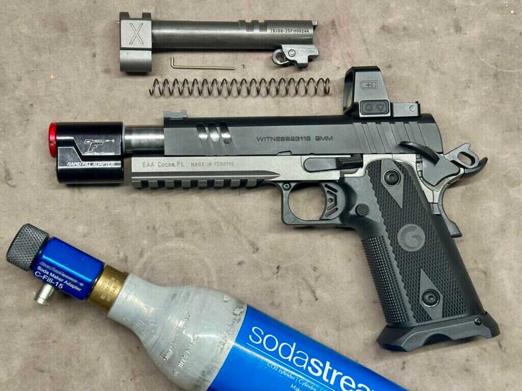 CoolFire Trainer barrel installed on Girsan Match X beside Soda Maker CO2 bottle