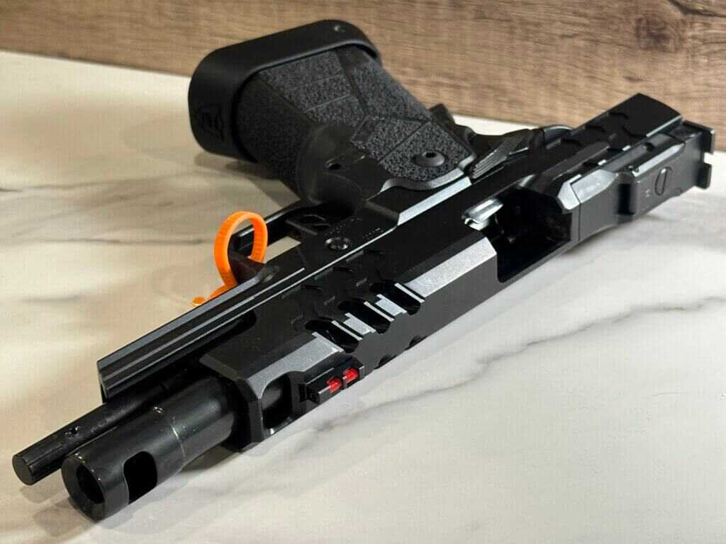 A closeup look at the port in the barrel and slide of the Kimber 2K11 Comp.