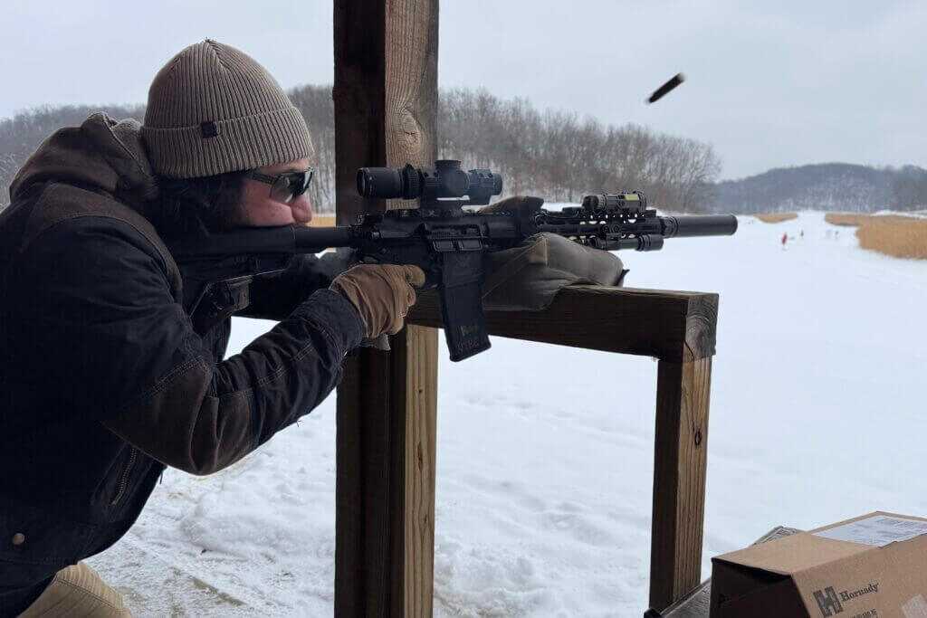Shooter engaging steel at 500 yards with Vortex AMG 1-10x24 LPVO during live-fire testing