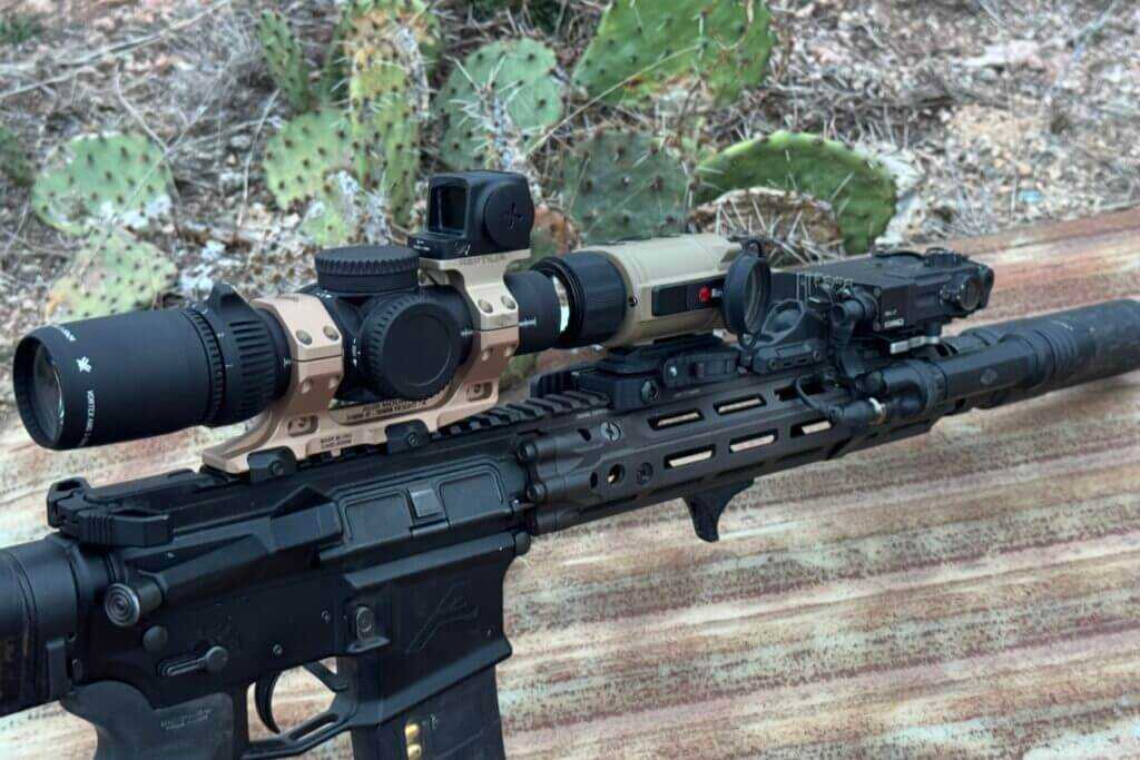 Vortex AMG 1-10x24 on short AR rail with thermal, pressure pad, and laser illuminator showing compact LPVO footprint