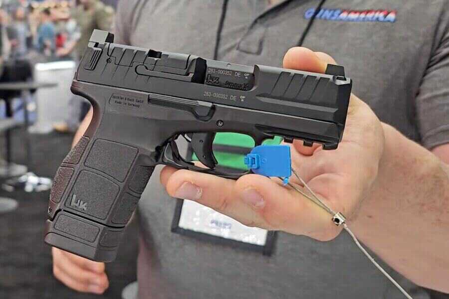 The all-new HK VP9CC in the hands on the showroom floor.