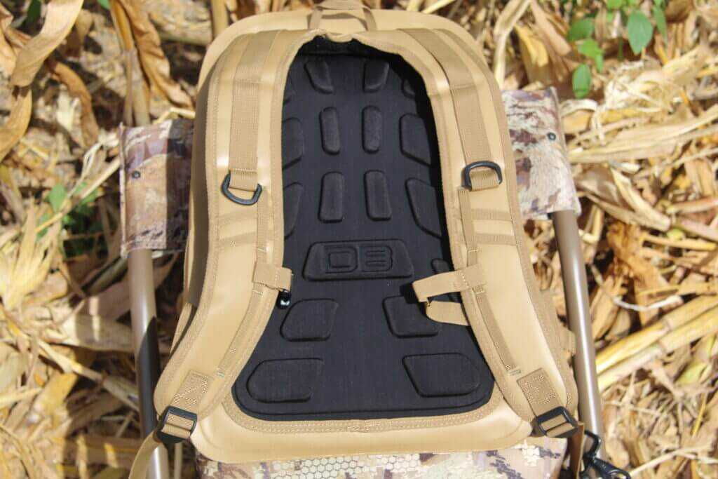 Padded adjustable backpack straps on Dive Bomb Waterproof Zip Backpack for bulky hunting clothing