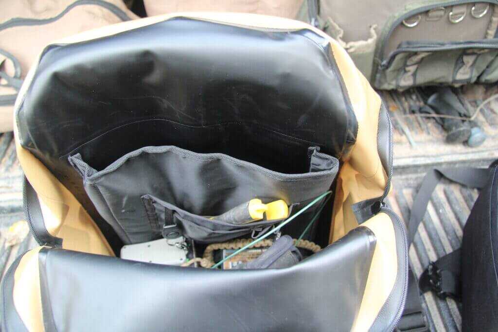 Interior storage pouches inside Dive Bomb Waterproof Zip Backpack for shells calls and dry gear