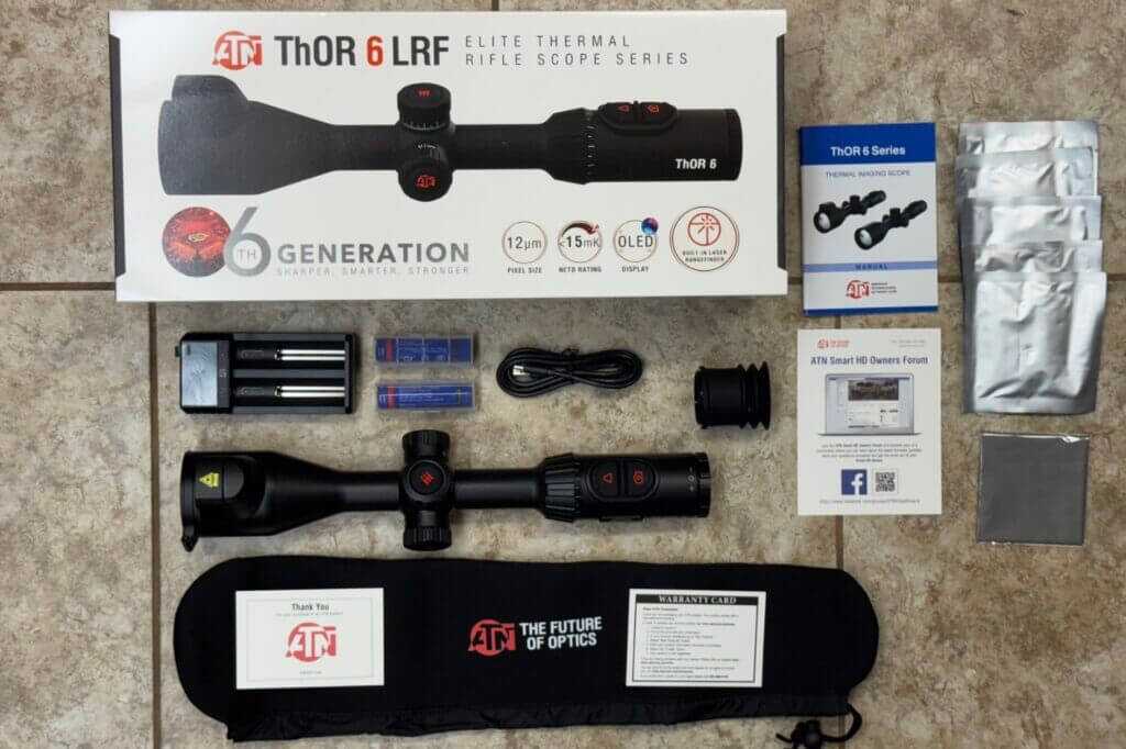 ATN ThOR 6 Elite LRF 640 box contents with batteries charger targets cloth lens cover and manual