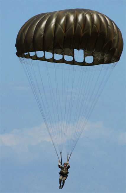 US Marine paratrooper descending beneath a parachute, illustrating the distinction between paratroopers and downed aviators
