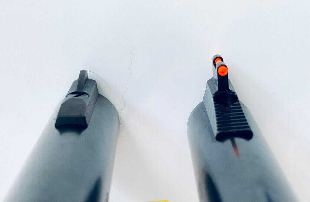 Original Henry Golden Boy front post beside the Golden Boy Deadeye red fiber-optic front sight