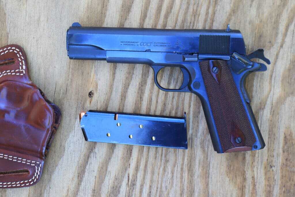 Colt Government Model .45 ACP Series 70 1911 with spare magazine and holster