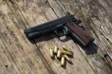 Colt 1911 pistol with 45 ACP ammunition