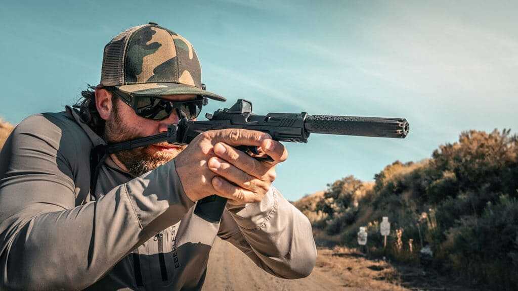 Suppressed Taurus TX22 Braced pistol fitted with Taurus TTX22 titanium rimfire suppressor