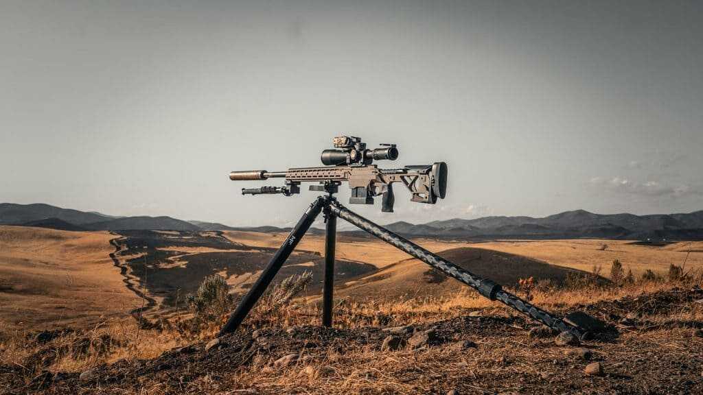 Leofoto Juggernaut carbon fiber shooting tripod rubber feet and included five-inch stainless steel spikes for hunting terrain