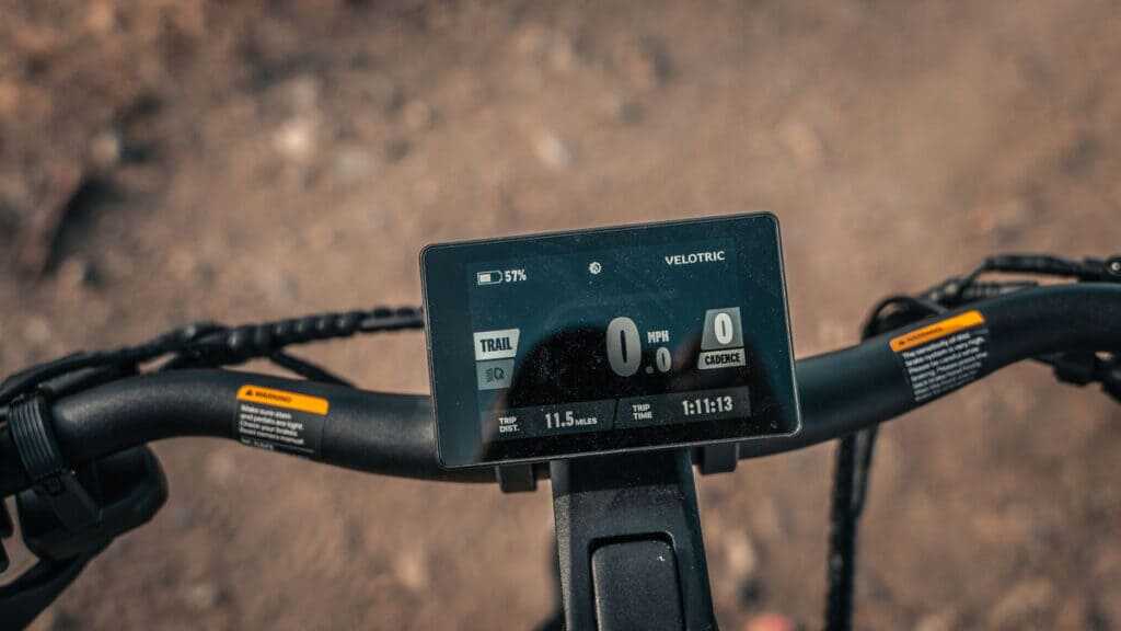 Velotric Nomad 2X handlebar display showing battery trip assist and speed information