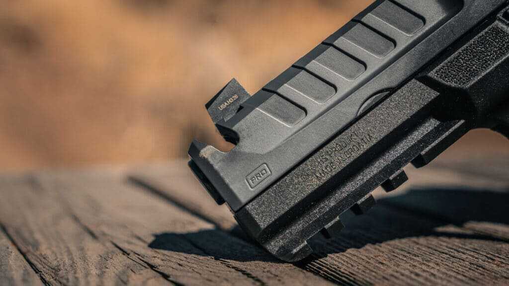 Springfield Echelon Pro 4.5F Comp integral compensator showing the ported barrel and matching slide cut for muzzle rise control