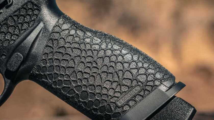 Close-up of Springfield Echelon Pro Badlands laser-applied grip texture on the black LightForged polymer frame