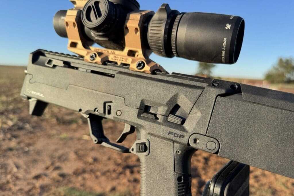 ZEV FDP folding 9mm pistol showing Glock-style magazine release and slide lock controls