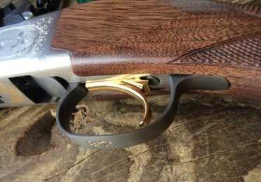 One of the steel parts is the actual trigger guard - note the different finish.