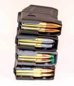 Notice how the magazine ribs support the cartridge case necks with the .223 Remington cartridges on the bottom. The ribs touch different parts of these various 300 Blackout projectiles directly.