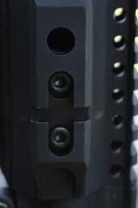 Parallax Tactical's Long Slim Forends The forend connects to the barrel nut with several hex screws.
