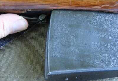The SVT magazine catch is really cool because it flips backward, locking the magazine in place.