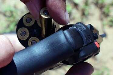 Smith & Wesson M&P .38 Hammerless Revolver w/Crimson Trace If there is one drawback to the revolver, it is loading. That said, you won't ever have magazine related feed issues, either.