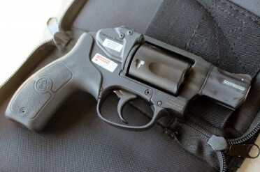Smith & Wesson M&P .38 Hammerless Revolver w/Crimson Trace The revolver is thin enough to conceal. The cylinder is right at an inch wide. And the length is typical for revolvers this size.