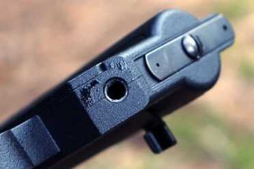 The back of the receiver. Note the two sizes of sight apertures. 